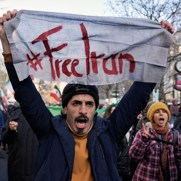 Protestors in Europe and North America engage in solidarity protests with protestors in Iran (Ebrahim Noroozi / Associated Press).